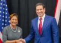 Kamla Persad-Bissessar and Marco Rubio shake hands ahead of Florida Summit meeting