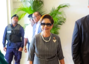Kamla Persad-Bissessar arriving at the CARICOM Summit with security detail