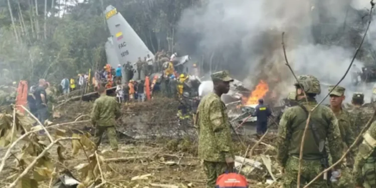 Colombian military personnel at crash site of Colombia military plane crash in Putumayo