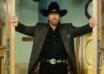 Chuck Norris dies at 86 as the Walker, Texas Ranger star appears in a doorway wearing a black cowboy hat