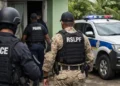 Illustration of Royal Saint Lucia Police officers during operation linked to Vieux Fort firearm recovery