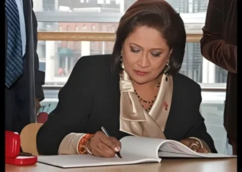 Kamla Persad-Bissessar signs official document as Kamla defends Trinidad State of Emergency amid opposition criticism