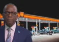 Prime Minister Philip J. Pierre pictured in front of a gas station as Pierre Warns of Fuel Price Impact amid scrutiny over fuel prices in St Lucia.