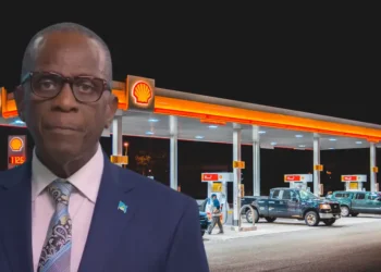 Prime Minister Philip J. Pierre pictured in front of a gas station as Pierre Warns of Fuel Price Impact amid scrutiny over fuel prices in St Lucia.