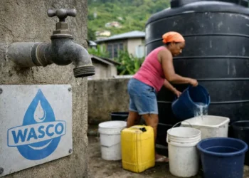 St Lucia Water Crisis image shows a resident filling buckets beside a WASCO water tank during prolonged outages