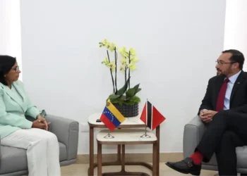 Delcy Rodríguez and Stuart Young meet during diplomatic engagement, highlighting the emerging CARICOM split in Caribbean regional relations.