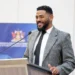 Dominic Smith Joins WEF Leadership Class as the Trinidad and Tobago minister speaks at a podium during an official event.