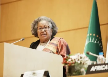 CARICOM crisis image of Dr Carla Barnett speaking at a regional meeting amid reappointment controversy