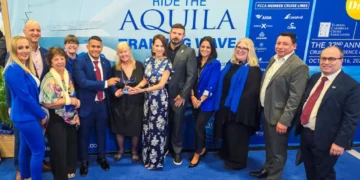 Aruba Tourism Authority officials accept the 2026 Aquila Whalesong Award at Seatrade Cruise Global