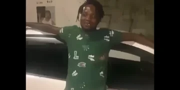 Kayson Simon, also known as “Bigs,” pictured leaning against a vehicle in an undated photo linked to the Soufriere deadly shooting investigation.