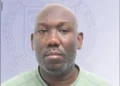 Phil Campbell appears in an official image following the Careille Drug Raid case in Castries, where he pleaded guilty and was fined $20,000.