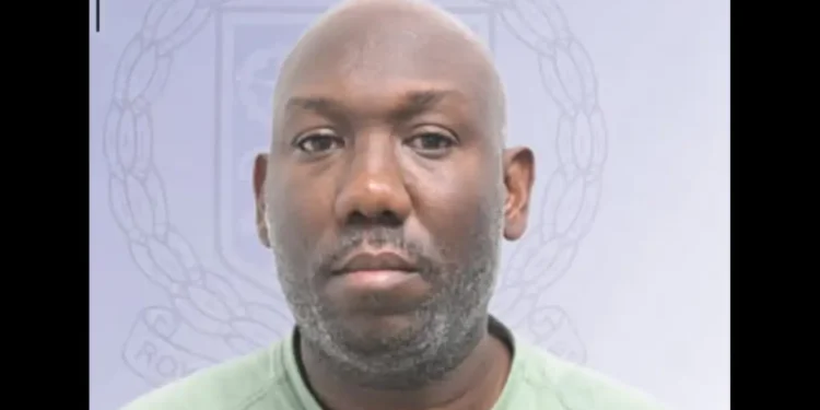 Phil Campbell appears in an official image following the Careille Drug Raid case in Castries, where he pleaded guilty and was fined $20,000.