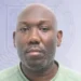 Phil Campbell appears in an official image following the Careille Drug Raid case in Castries, where he pleaded guilty and was fined $20,000.