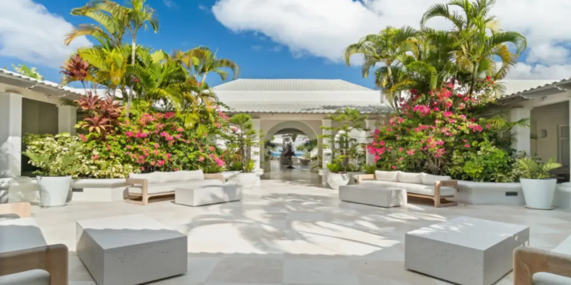 Open-air courtyard with tropical landscaping at Spice Island Beach Resort on Grand Anse Beach, Grenada.