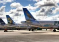 JetBlue aircraft between two Frontier Airlines aircraft on tarmac as ULCC collapse fears mount.