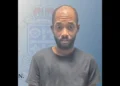 Official police charge graphic showing Joshua Paul after a Massade shooting murder charge was filed in the fatal Gros Islet case.