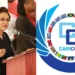Kamla Persad-Bissessar speaking at a podium alongside the Caricom logo representing the T&T defies Caricom reappointment dispute.