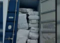 Drug Seizure Turns Cold as open shipping container is seen packed with wrapped bundles in St Lucia