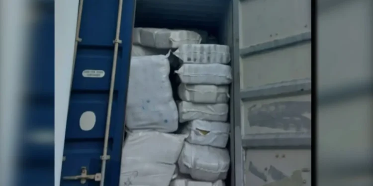 Drug Seizure Turns Cold as open shipping container is seen packed with wrapped bundles in St Lucia