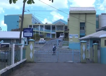 Closed gate of the St. Lucia Polyclinic and National Eye Clinic compound in Castries, May 2026.