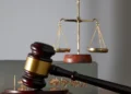 Gavel and scales of justice symbolising the St Lucia unlawful detention ruling.
