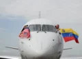 US-Venezuela flights resume as American Airlines pilots display US and Venezuelan flags from the cockpit, April 30, 2026.