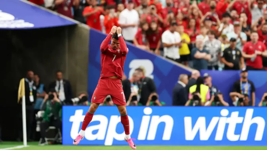 Ronaldo World Cup Record celebration as Cristiano Ronaldo jumps with fists raised after scoring for Portugal against Uzbekistan at the 2026 FIFA World Cup in Houston