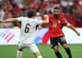 Egypt makes history at the World Cup 2026 as number 10 drives past New Zealand defender Bell in Vancouver