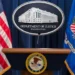 Department of Justice podium during announcement of the Health Care Fraud Takedown that charged 455 defendants in alleged $6.5 billion fraud schemes.