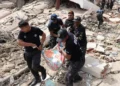 Venezuela earthquake death toll rises as police carry body recovered from collapsed building rubble in La Guaira June 25 2026