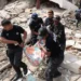 Venezuela earthquake death toll rises as police carry body recovered from collapsed building rubble in La Guaira June 25 2026