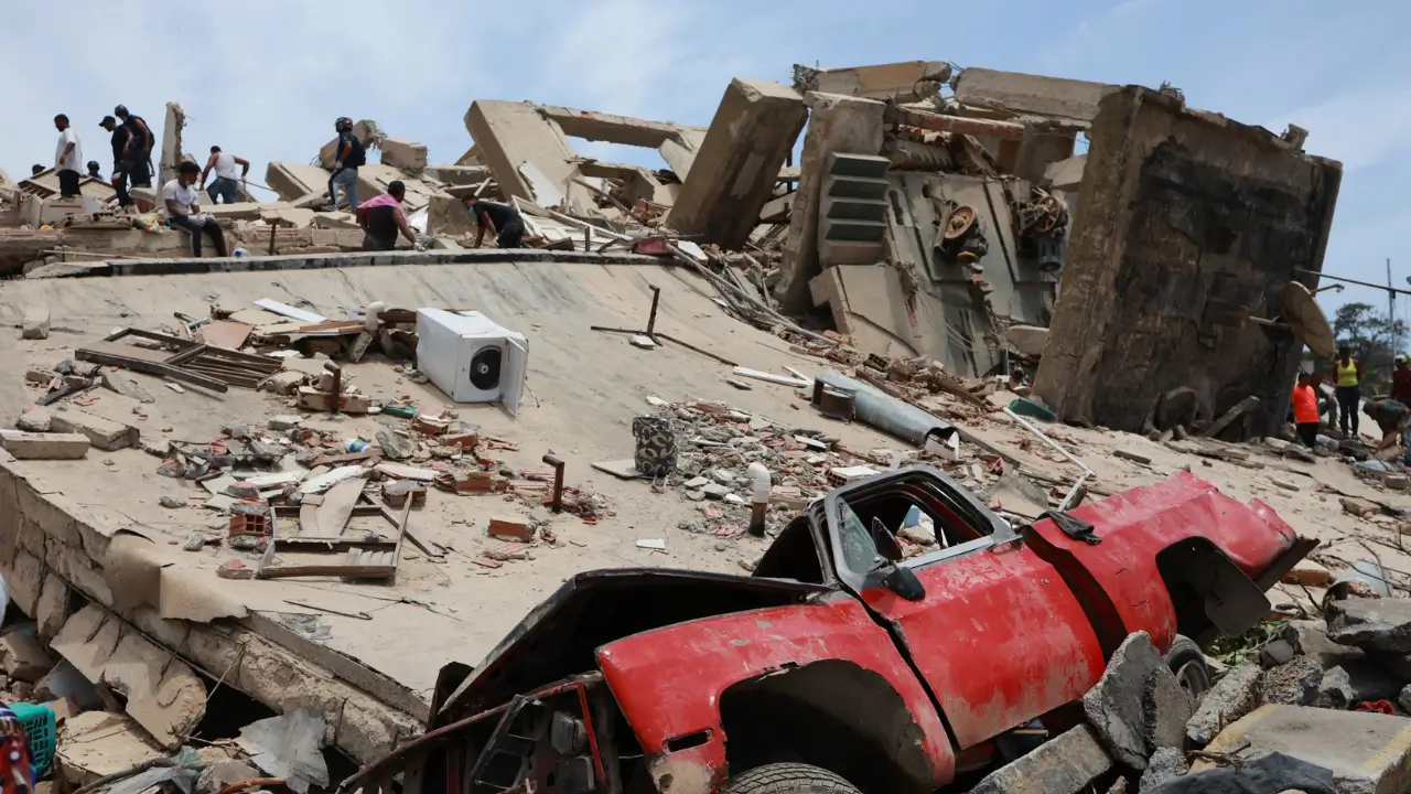 Venezuela earthquake crushed vehicle buried under collapsed building rubble in La Guaira June 25 2026
