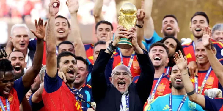 Spain celebrates with the FIFA World Cup trophy after winning the 2026 FIFA World Cup Final against Argentina.