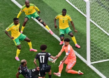 Canada reaches Round of 16 after a tense goalmouth battle against South Africa in the World Cup knockout stage.