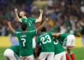 Mexico players celebrate their World Cup knockout drought win over Ecuador at Estadio Azteca.