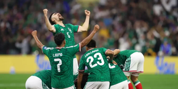Mexico players celebrate their World Cup knockout drought win over Ecuador at Estadio Azteca.