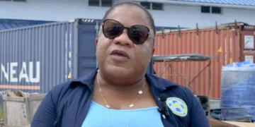 St. Jude Hospital CEO Lydia Atkins speaking outside the hospital compound.