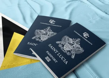Saint Lucia passports on the national flag, symbolizing the St Lucia CBI Programme phase-out ordered by the EU