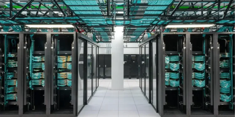 AI data center server racks illustrating Trinidad’s Caribbean AI deals and concerns over water and electricity demand.