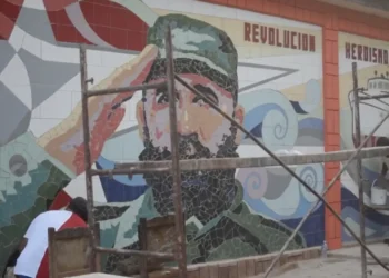 US State Department Cuba report featured image showing a Fidel Castro mural in Cuba.