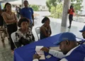 Haiti voter registration officials process applicants in Port-au-Prince