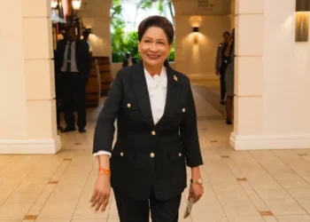 Prime Minister Kamla Persad-Bissessar amid Trinidad and Tobago economic growth projections