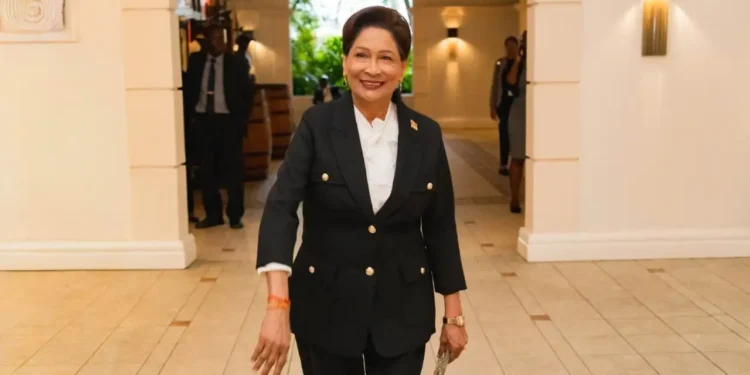Prime Minister Kamla Persad-Bissessar amid Trinidad and Tobago economic growth projections