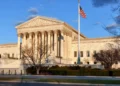 US immigrant visa policy ruling represented by a federal courthouse and American flag