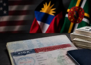US visa bond program image showing a US visa, passport, cash and Caribbean flags.