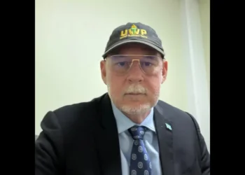 Allen Chastanet wearing a black United Workers Party cap, central to the debate over Chastanet's Political Masterstroke.
