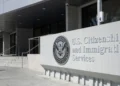 USCIS building entrance displaying the agency's official signage as USCIS citizenship approvals decline in 2026.
