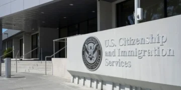 USCIS building entrance displaying the agency's official signage as USCIS citizenship approvals decline in 2026.
